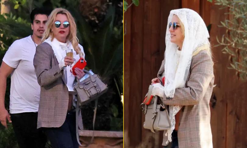 Бритни Спирс с бокалом шампанского в руках