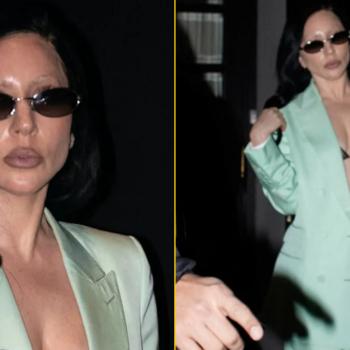 Преображённая Леди Гага в деловом костюме щеголяет бюстгальтером на улицах Парижа