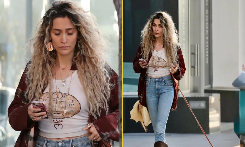 Пэрис Джексон гуляет со своей собакой