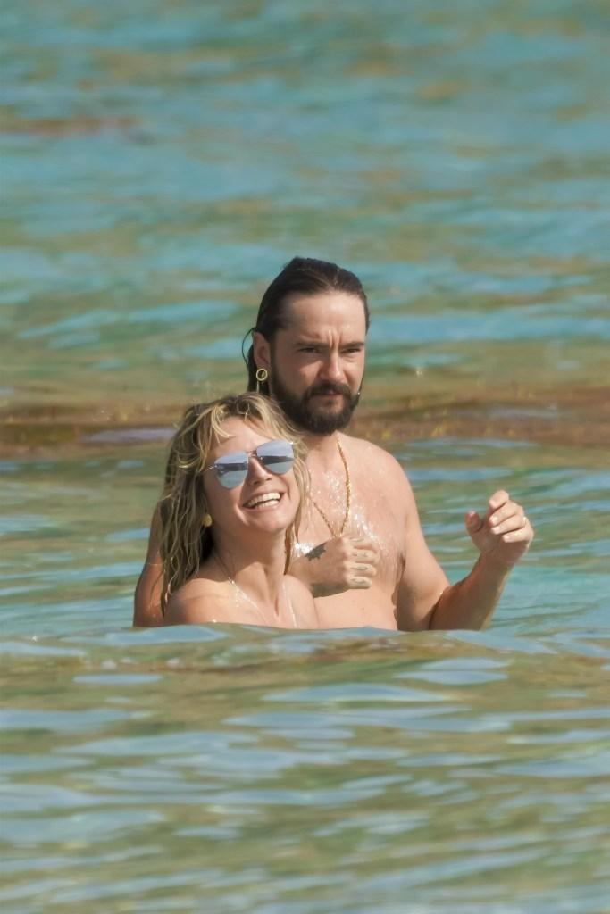 Heidi Klum continued to ditch her bikini top during her St. Barts vacation with her husband, Tom Kaulitz.  